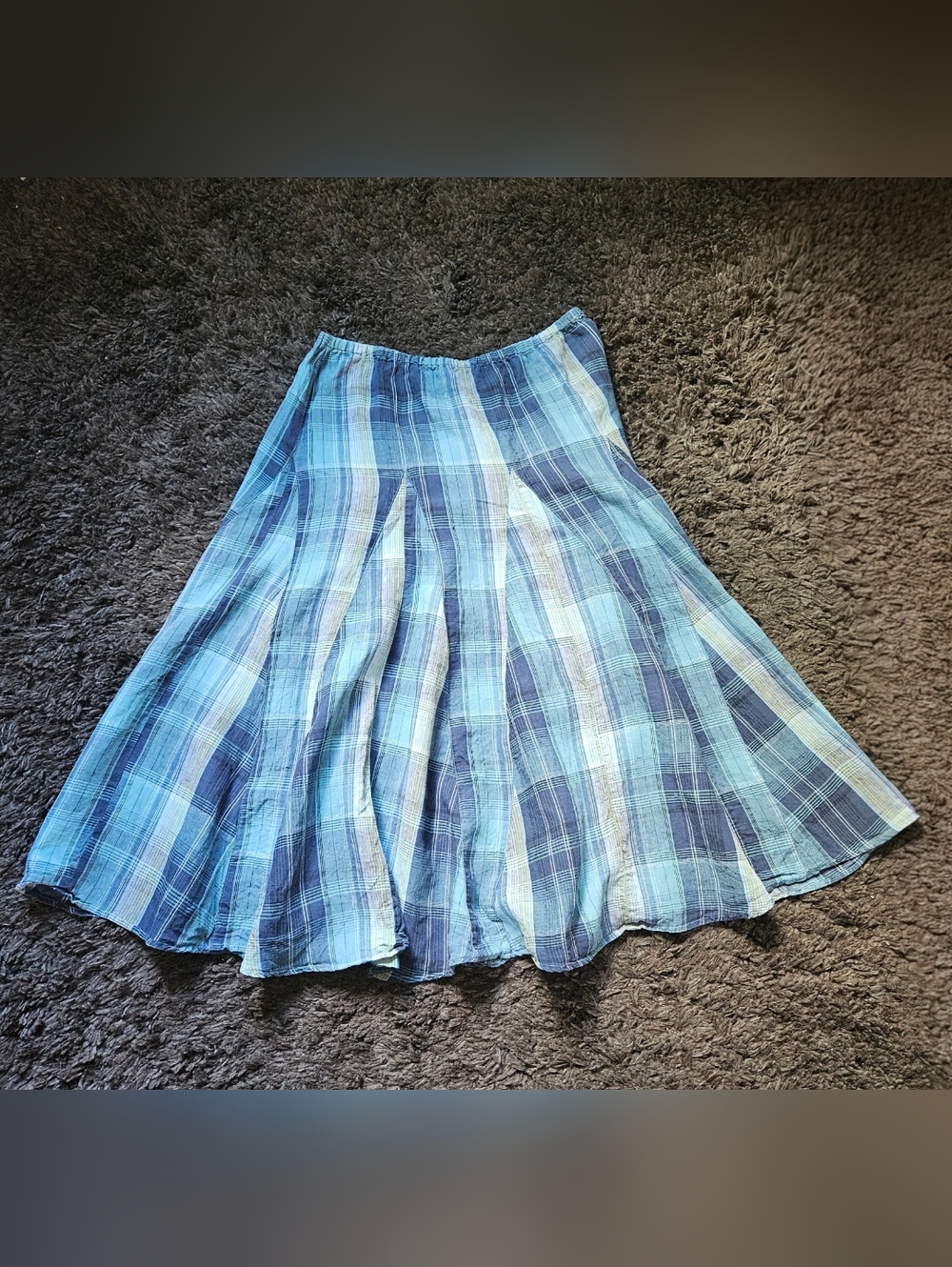 Vintage Tapemeasure size 14 A-line midi skirt featuring a classic plaid pattern